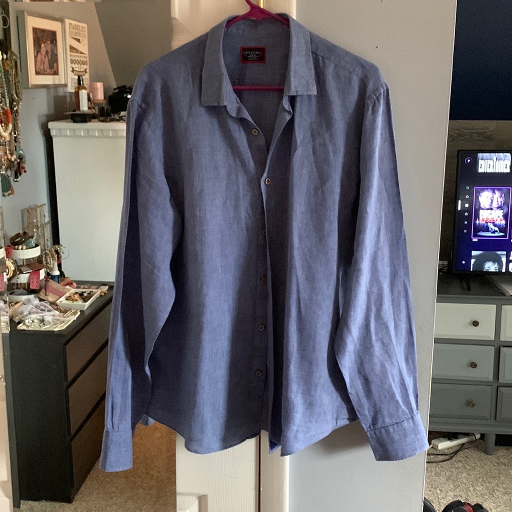 UNTUCKit blue button up long sleeves shirt.
